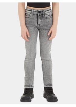 Calvin Klein Jeans Jeansy IG0IG02155 Szary Skinny Fit ze sklepu MODIVO w kategorii Spodnie dziewczęce - zdjęcie 168519506
