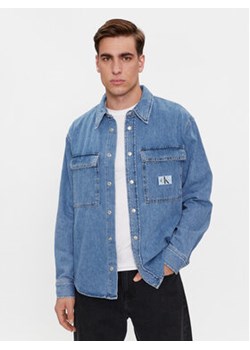 Calvin Klein Jeans Koszula jeansowa Relaxed Linear Denim Shirt J30J324582 Granatowy Regular Fit ze sklepu MODIVO w kategorii Koszule męskie - zdjęcie 168527099