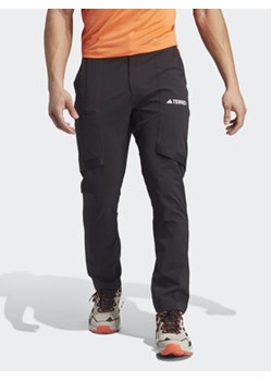 adidas Spodnie dresowe IB1119 Czarny Regular Fit ze sklepu MODIVO w kategorii Spodnie męskie - zdjęcie 168527717