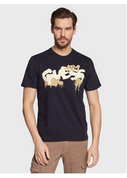Guess T-Shirt Graffiti Logo M3GI59 K9RM1 Granatowy Slim Fit ze sklepu MODIVO w kategorii T-shirty męskie - zdjęcie 168527719