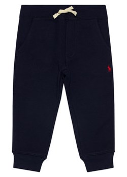 Polo Ralph Lauren Spodnie dresowe Core Replen 323720897003 Granatowy Regular Fit ze sklepu MODIVO w kategorii Spodnie chłopięce - zdjęcie 168527939