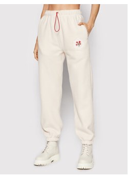 Local Heroes Spodnie dresowe Fell So Vintage AW21P0027 Beżowy Regular Fit ze sklepu MODIVO w kategorii Spodnie damskie - zdjęcie 168528129