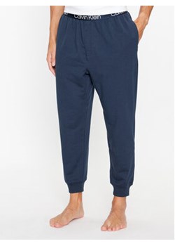 Calvin Klein Underwear Spodnie piżamowe 000NM2175E Niebieski Regular Fit ze sklepu MODIVO w kategorii Piżamy męskie - zdjęcie 168530288
