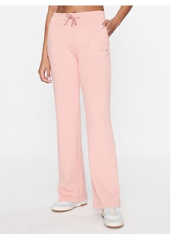 Guess Spodnie dresowe V3BB11 KB212 Różowy Regular Fit ze sklepu MODIVO w kategorii Spodnie damskie - zdjęcie 168530908