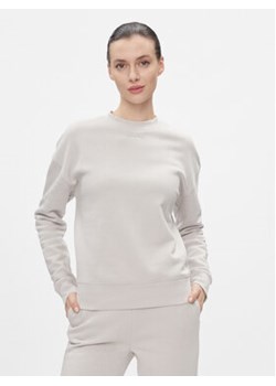 Calvin Klein Bluza Metallic Micro Logo Sweatshirt K20K206961 Beżowy Regular Fit ze sklepu MODIVO w kategorii Bluzy damskie - zdjęcie 168531319