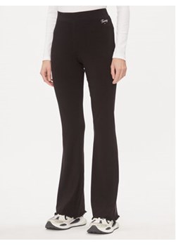 Tommy Jeans Spodnie materiałowe DW0DW17311 Czarny Flare Fit ze sklepu MODIVO w kategorii Spodnie damskie - zdjęcie 168531705