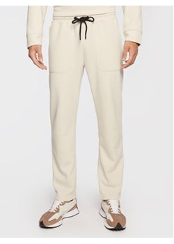 Sisley Spodnie dresowe 322WSF006 Beżowy Regular Fit ze sklepu MODIVO w kategorii Spodnie męskie - zdjęcie 168533109