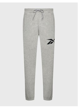 Reebok Spodnie dresowe Brand Proud HS6849 Szary Regular Fit ze sklepu MODIVO w kategorii Spodnie męskie - zdjęcie 168534285