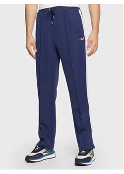 Fila Spodnie dresowe Bruges FAM0174 Granatowy Regular Fit ze sklepu MODIVO w kategorii Spodnie męskie - zdjęcie 168541565