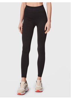 Tommy Hilfiger Legginsy Shiny Seamless S10S101502 Czarny Slim Fit ze sklepu MODIVO w kategorii Spodnie damskie - zdjęcie 168548998