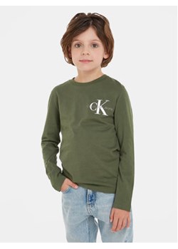 Calvin Klein Jeans Bluzka IB0IB01457 Zielony Regular Fit ze sklepu MODIVO w kategorii T-shirty chłopięce - zdjęcie 168549747