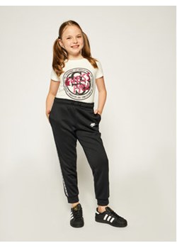 Nike Spodnie dresowe Older Kids' AV8388 Czarny Regular Fit ze sklepu MODIVO w kategorii Spodnie dziewczęce - zdjęcie 168550877