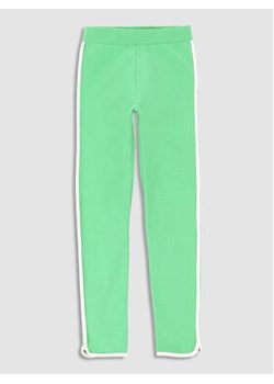 Coccodrillo Legginsy WC3121101EVG Zielony Regular Fit ze sklepu MODIVO w kategorii Spodnie dziewczęce - zdjęcie 168551056