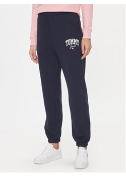 Tommy Jeans Spodnie dresowe DW0DW16379 Granatowy Relaxed Fit ze sklepu MODIVO w kategorii Spodnie damskie - zdjęcie 168551575