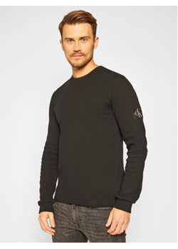 Calvin Klein Jeans Sweter J30J316610 Czarny Regular Fit ze sklepu MODIVO w kategorii Swetry męskie - zdjęcie 168553209