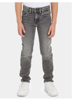 Calvin Klein Jeans Jeansy Visual IB0IB01777 Szary Slim Fit ze sklepu MODIVO w kategorii Spodnie chłopięce - zdjęcie 168554969