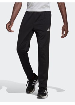 adidas Spodnie dresowe AEROREADY Game and Go Small Logo Tapered Joggers HL2180 Czarny Regular Fit ze sklepu MODIVO w kategorii Spodnie męskie - zdjęcie 168556855