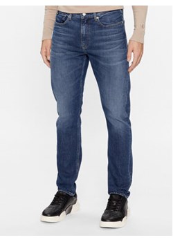Calvin Klein Jeans Jeansy J30J323372 Granatowy Slim Fit ze sklepu MODIVO w kategorii Jeansy męskie - zdjęcie 168558338