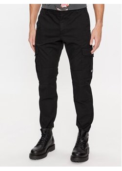 Tommy Jeans Spodnie materiałowe Ethan DM0DM17898 Czarny Relaxed Fit ze sklepu MODIVO w kategorii Spodnie męskie - zdjęcie 168562906