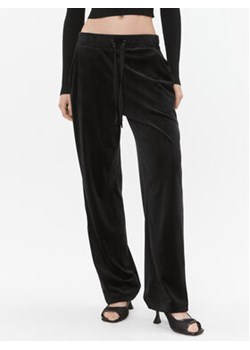 DKNY Spodnie dresowe P3MF6SIV Czarny Regular Fit ze sklepu MODIVO w kategorii Spodnie damskie - zdjęcie 168563228