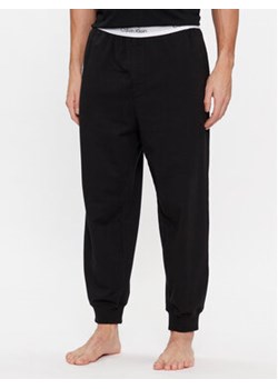 Calvin Klein Underwear Spodnie piżamowe 000NM2302E Czarny Regular Fit ze sklepu MODIVO w kategorii Piżamy męskie - zdjęcie 168563905