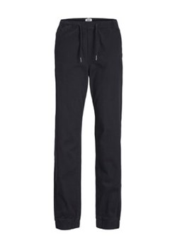 Jack&Jones Junior Spodnie dresowe 12236801 Czarny Comfort Fit ze sklepu MODIVO w kategorii Spodnie chłopięce - zdjęcie 168564408