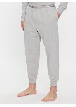 Calvin Klein Underwear Spodnie piżamowe 000NM2175E Szary Relaxed Fit ze sklepu MODIVO w kategorii Piżamy męskie - zdjęcie 168565168