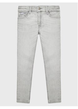 Calvin Klein Jeans Jeansy IG0IG01889 Szary Skinny Fit ze sklepu MODIVO w kategorii Spodnie chłopięce - zdjęcie 168565358