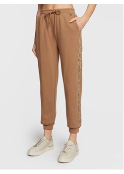 Rinascimento Spodnie dresowe CFC0109867003 Brązowy Regular Fit ze sklepu MODIVO w kategorii Spodnie damskie - zdjęcie 168569157