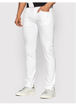 Armani Exchange Jeansy 8NZJ13 Z1SBZ 1100 Biały Slim Fit ze sklepu MODIVO w kategorii Jeansy męskie - zdjęcie 168570147