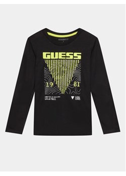 Guess Bluzka L3BI29 I3Z13 Czarny Regular Fit ze sklepu MODIVO w kategorii T-shirty chłopięce - zdjęcie 168571016