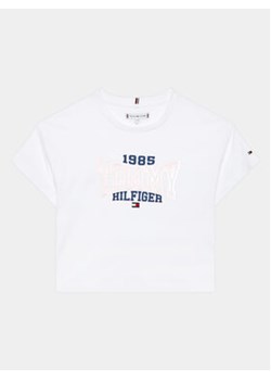 Tommy Hilfiger T-Shirt 1985 KG0KG07441 D Biały Regular Fit ze sklepu MODIVO w kategorii Bluzki dziewczęce - zdjęcie 168573028