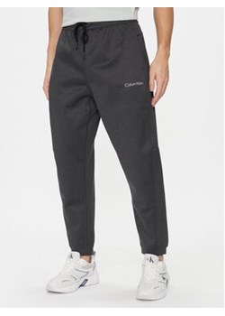 Calvin Klein Performance Spodnie dresowe 00GMF3P613 Czarny Regular Fit ze sklepu MODIVO w kategorii Spodnie męskie - zdjęcie 168573867