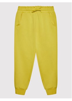 United Colors Of Benetton Spodnie dresowe 3QLACF00H Żółty Regular Fit ze sklepu MODIVO w kategorii Spodnie dziewczęce - zdjęcie 168579169