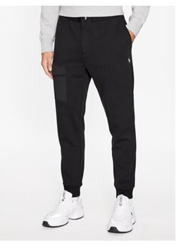 Polo Ralph Lauren Spodnie dresowe 710900910001 Czarny Slim Fit ze sklepu MODIVO w kategorii Spodnie męskie - zdjęcie 168580885
