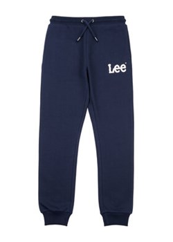 Lee Spodnie dresowe Wobbly Graphic LEE0011 Granatowy Regular Fit ze sklepu MODIVO w kategorii Spodnie chłopięce - zdjęcie 168585827