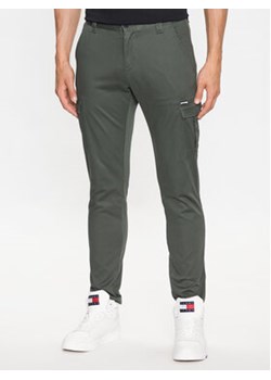 Tommy Jeans Spodnie materiałowe DM0DM14484 Zielony Slim Fit ze sklepu MODIVO w kategorii Spodnie męskie - zdjęcie 168588546