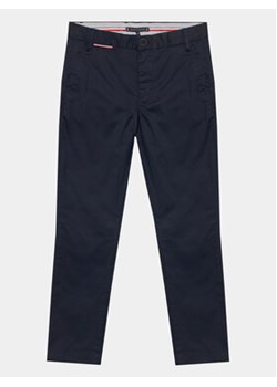 Tommy Hilfiger Spodnie materiałowe KB0KB08609 D Granatowy Slim Fit ze sklepu MODIVO w kategorii Spodnie chłopięce - zdjęcie 168589967