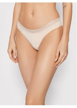 Calvin Klein Underwear Stringi 000QF6307E Écru ze sklepu MODIVO w kategorii Majtki damskie - zdjęcie 168593615