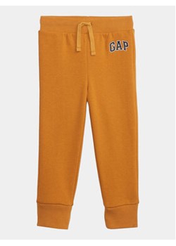 Gap Spodnie dresowe 748000-07 Brązowy Regular Fit ze sklepu MODIVO w kategorii Spodnie chłopięce - zdjęcie 168595476