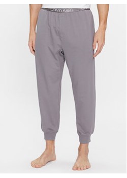Calvin Klein Underwear Spodnie piżamowe 000NM2175E Szary Regular Fit ze sklepu MODIVO w kategorii Piżamy męskie - zdjęcie 168601169