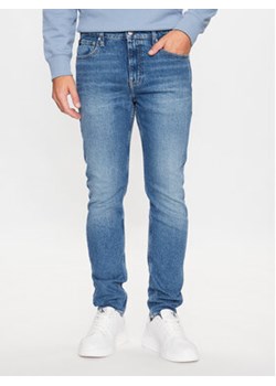 Calvin Klein Jeans Jeansy J30J323367 Granatowy Slim Taper Fit ze sklepu MODIVO w kategorii Jeansy męskie - zdjęcie 168601315