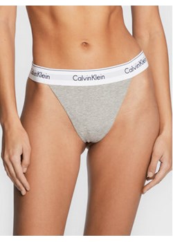 Calvin Klein Underwear Stringi 000QF7013E Szary ze sklepu MODIVO w kategorii Majtki damskie - zdjęcie 168604938