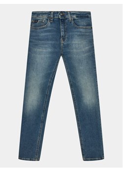 Calvin Klein Jeans Jeansy IB0IB01912 Niebieski Slim Fit ze sklepu MODIVO w kategorii Spodnie chłopięce - zdjęcie 168605639