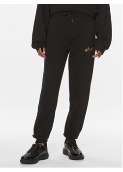 Hugo Spodnie dresowe Easy 50509171 Czarny Relaxed Fit ze sklepu MODIVO w kategorii Spodnie damskie - zdjęcie 168605998