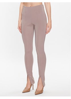 Calvin Klein Legginsy K20K205357 Beżowy Slim Fit ze sklepu MODIVO w kategorii Spodnie damskie - zdjęcie 168607938