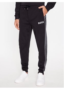 Boss Spodnie dresowe Tracksuit Pants 50503052 Czarny Regular Fit ze sklepu MODIVO w kategorii Spodnie męskie - zdjęcie 168610498