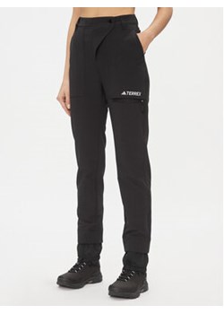 adidas Spodnie outdoor IB1131 Czarny Regular Fit ze sklepu MODIVO w kategorii Spodnie damskie - zdjęcie 168612469