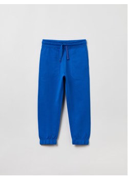 OVS Spodnie dresowe 1757951 Niebieski Regular Fit ze sklepu MODIVO w kategorii Spodnie chłopięce - zdjęcie 168615117