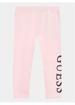 Guess Legginsy K3YB01 K82K0 Różowy Slim Fit ze sklepu MODIVO w kategorii Spodnie dziewczęce - zdjęcie 168620667